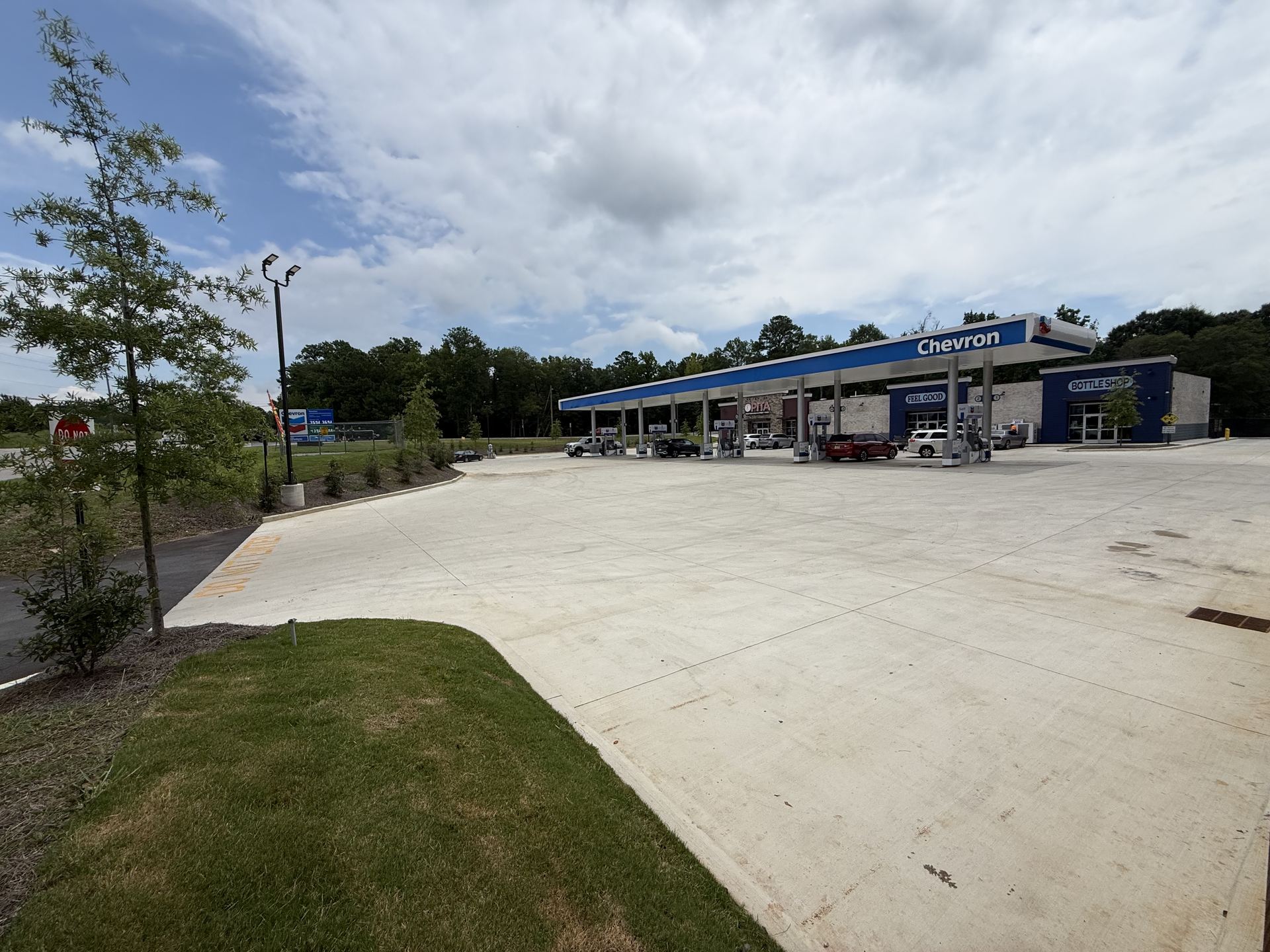 Wide view of the completed Calera, Alabama convenience store site with Chevron fuel canopy