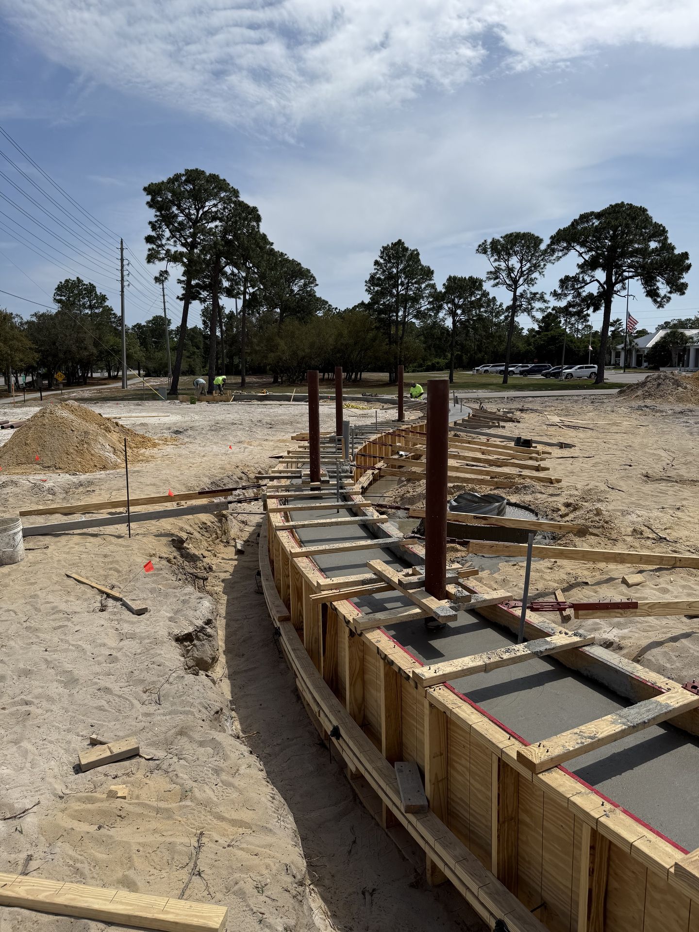 Curved concrete formwork for the flag array footings at the Orange Beach veterans memorial